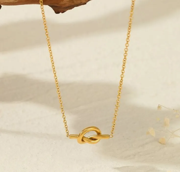 Knot it 🎀🤍 Simple and gorgeous necklace perfect for everyday use_ Non tarnish & hypoallergenic Necklace only_ N8,000 Necklace with matching bracelet _ N12,000 #necklace #lagosjewelrystore #lagosjewelry #goldjewel.webp