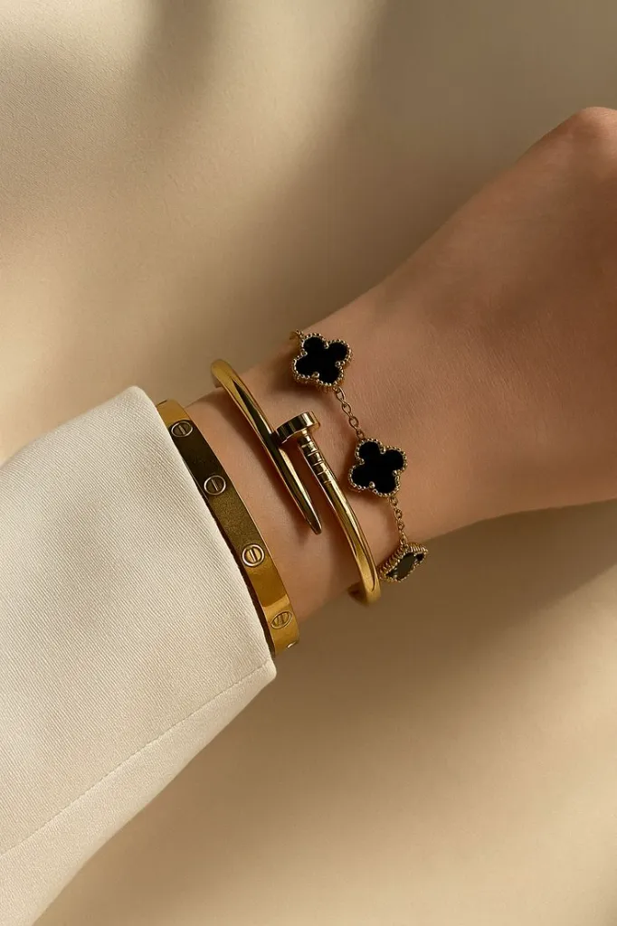 Stacked Gold & Black Elegance – Luxury Bracelet Styling.webp
